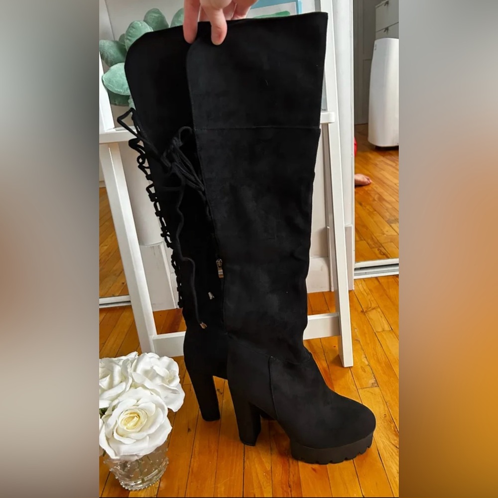 Tight high suede boots